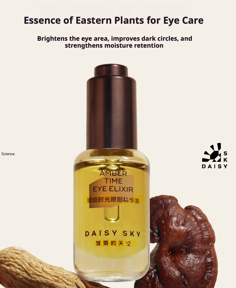 DAISY SKY Amber Time Eye Elixir Oil bottle with amber liquid and brown dropper cap; Daisy Sky logo to the side.