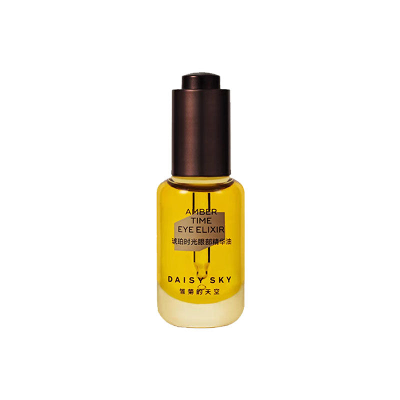 DAISY SKY Amber Time Eye Elixir Oil bottle with amber liquid and dark cap