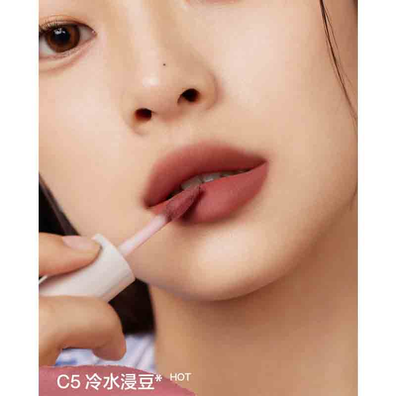 INTO YOU Airy Lip & Cheek Mud offers lightweight, long-lasting wear with a smooth, blendable texture for a natural or bold look on lips and cheeks.