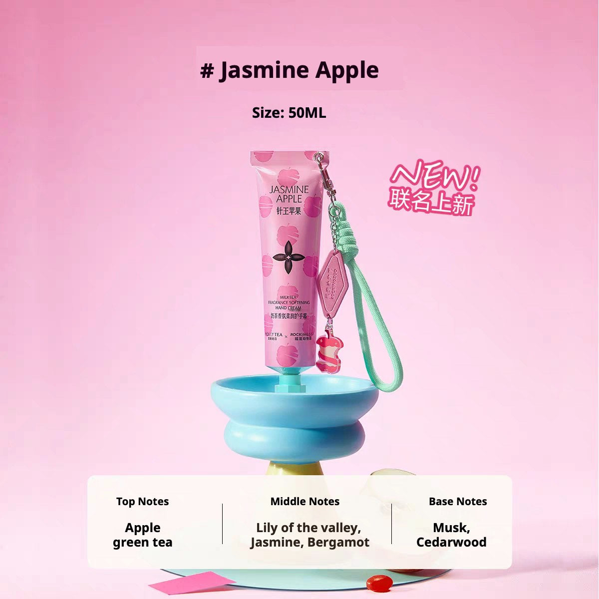 Mollytea Rockingzoo Hand Cream tube with pastel pink packaging and charm, displayed on a blue pedestal.