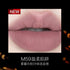 Close-up of lips wearing Girlcult Four Great Inventions Lip Glaze in M59, a misty grayish pink shade with a matte finish