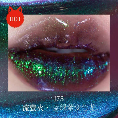 Close-up of lips wearing Girlcult The Classic of Bizarre Tales Lip Glaze in J75, showcasing a stunning blue-green duochrome gloss with vibrant sparkle