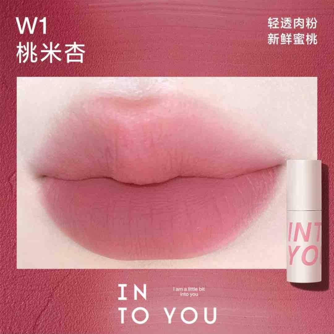 INTO YOU Airy Lip &amp; Cheek Mud in W1, featuring a light, peachy-pink color that brings a fresh, lively glow