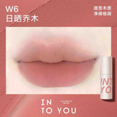 INTO YOU Airy Lip & Cheek Mud in W6, showcasing a soft, natural beige-pink shade perfect for a subtle everyday look