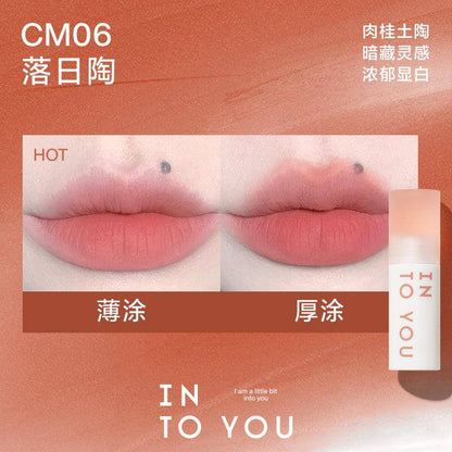 INTO YOU Cloudy Lip Mud in CM06, showcasing a rich terracotta color, perfect for creating a warm and earthy lip finish