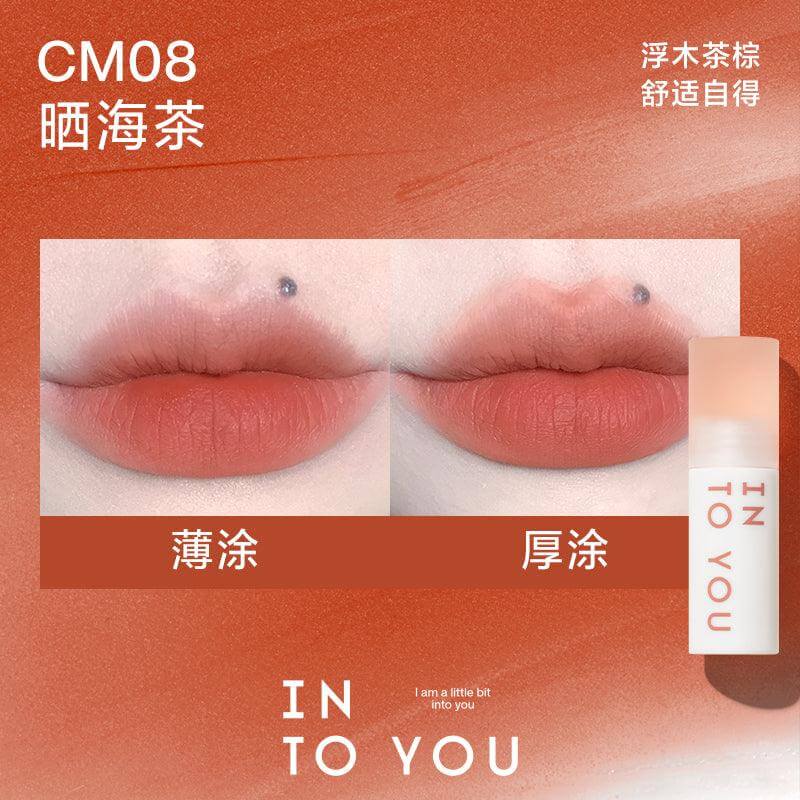 INTO YOU Cloudy Lip Mud in CM08, featuring a warm tea-brown shade, ideal for a comfortable and natural look