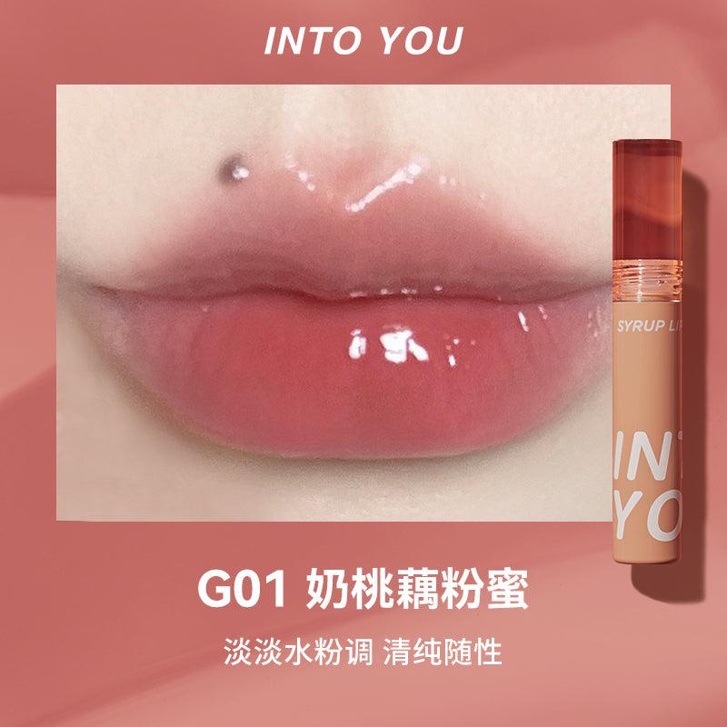 Experience the INTO YOU Syrup Glossy Lip Tint—long-lasting, multidimensional lip gloss with vibrant colors and moisturizing texture. Non-sticky, lightweight formula perfect for all-day lip protection, especially in dry weather.