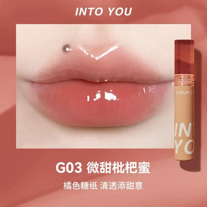 Experience the INTO YOU Syrup Glossy Lip Tint—long-lasting, multidimensional lip gloss with vibrant colors and moisturizing texture. Non-sticky, lightweight formula perfect for all-day lip protection, especially in dry weather.