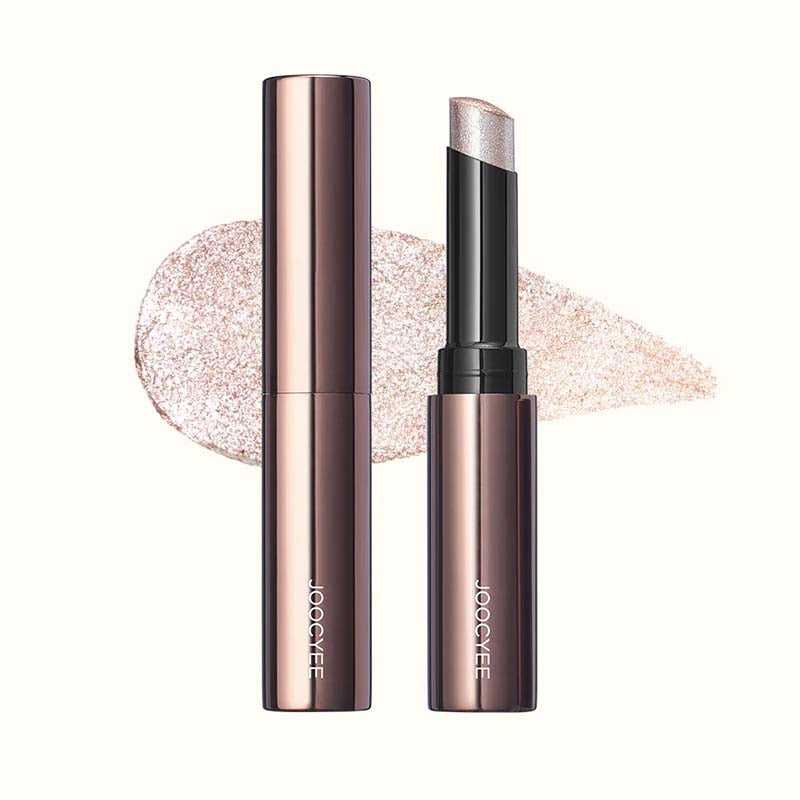 Rose gold makeup stick with applicator and JOOCYE branding on a white background