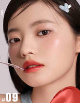 the model shows the Judydoll Ice Watery Lip Gloss in 