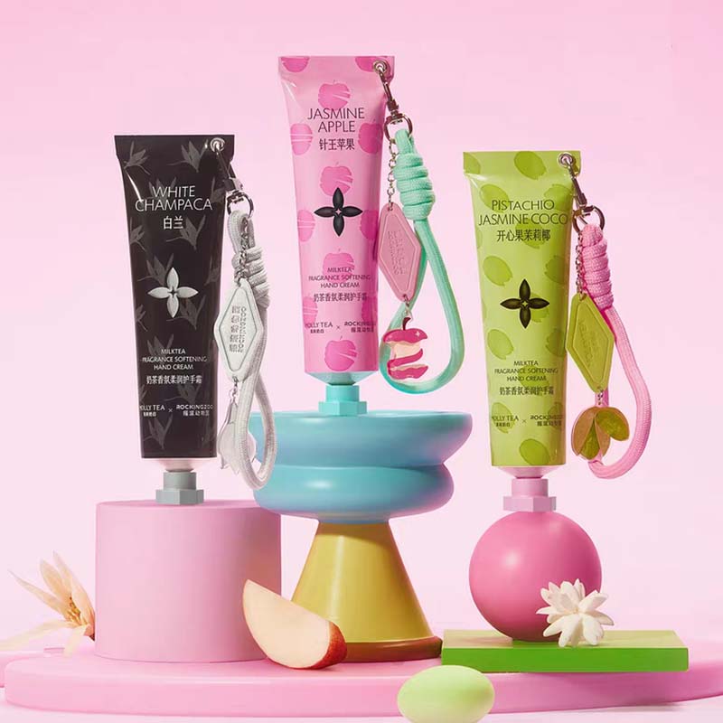 Mollytea Rockingzoo Hand Cream trio with colorful tubes and attached charms on a pastel display.