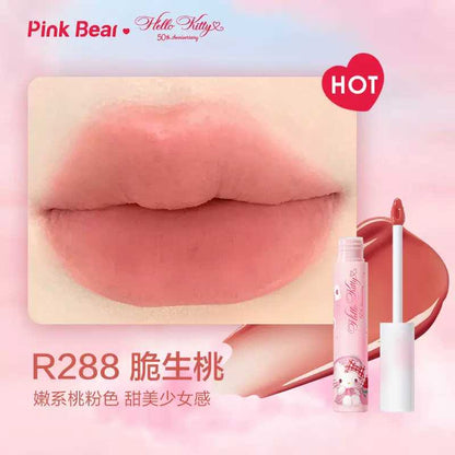 Achieve a velvety matte look with Pink Bear Hello Kitty Water Mist Lip Gloss. This water-to-matte formula keeps lips hydrated inside while offering a soft matte finish. Available in six stunning shades for all skin tones and occasions.