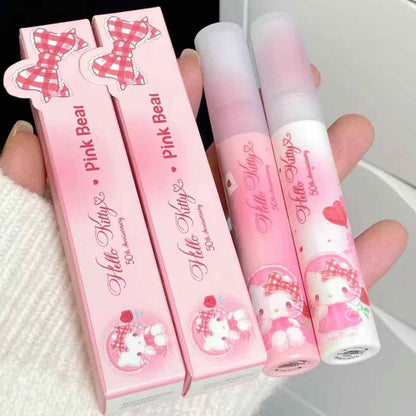 Achieve a velvety matte look with Pink Bear Hello Kitty Water Mist Lip Gloss. This water-to-matte formula keeps lips hydrated inside while offering a soft matte finish. Available in six stunning shades for all skin tones and occasions.