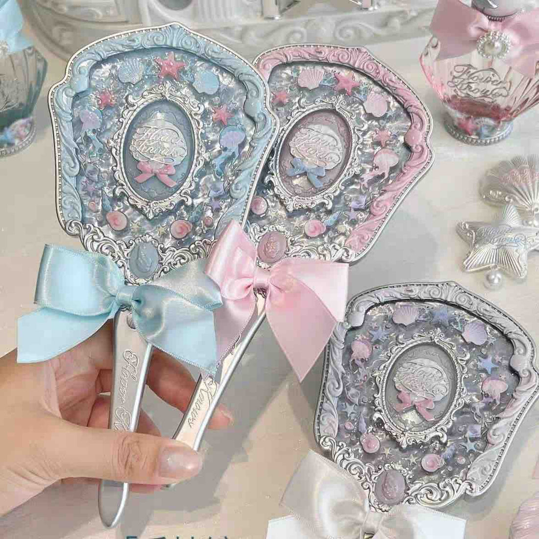 FK hand mirror