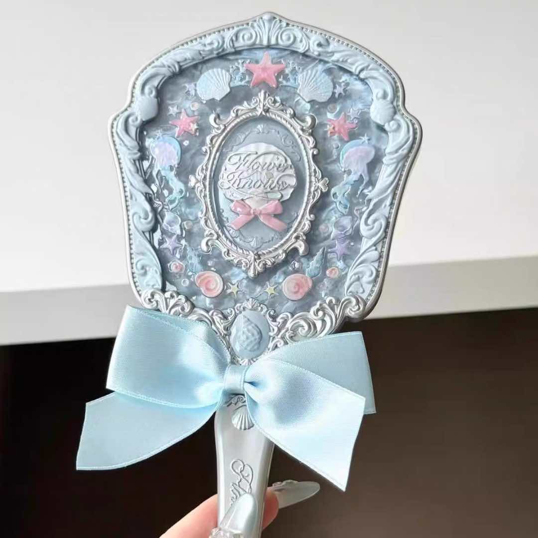 FK hand mirror