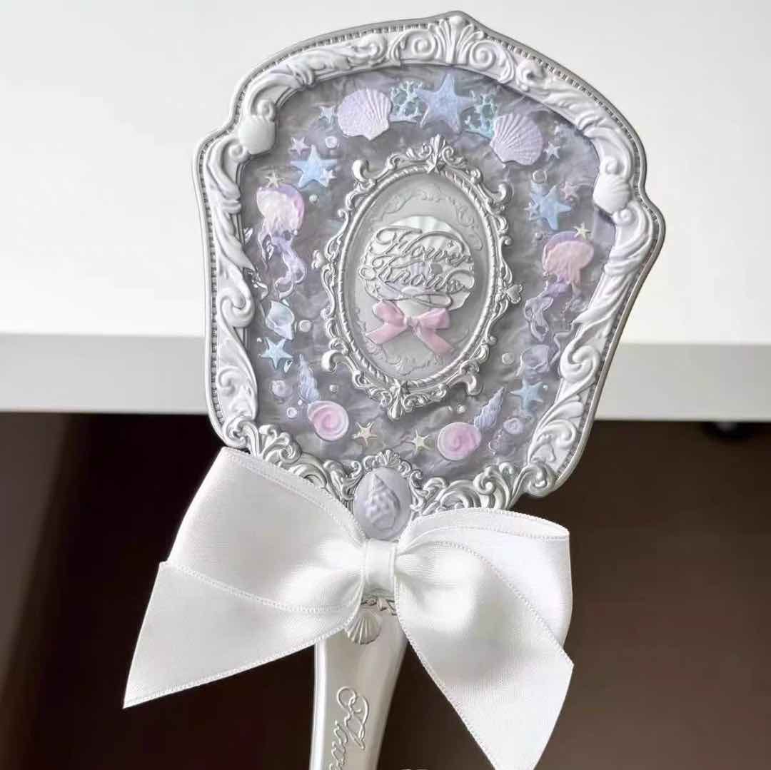 FK hand mirror