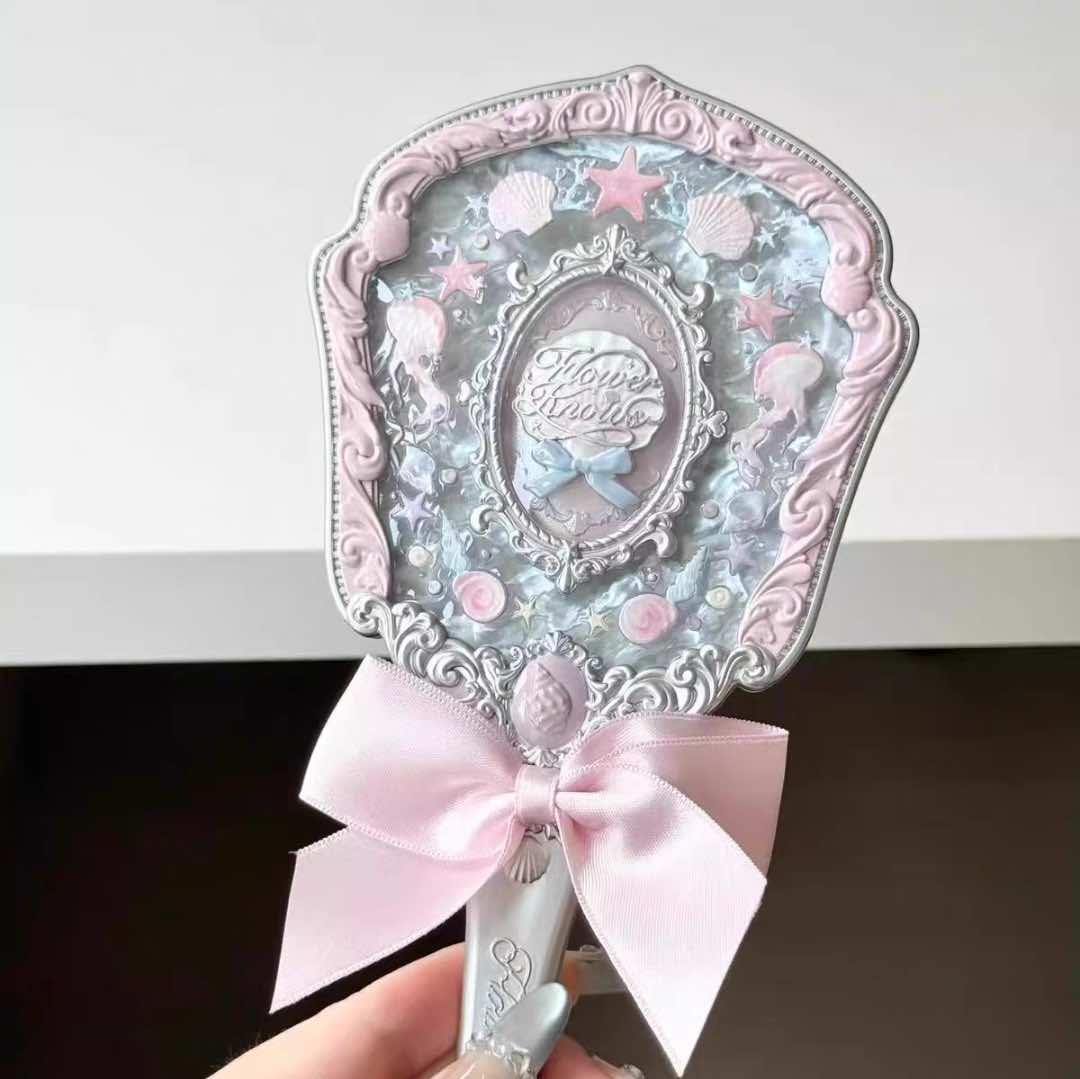 FK hand mirror