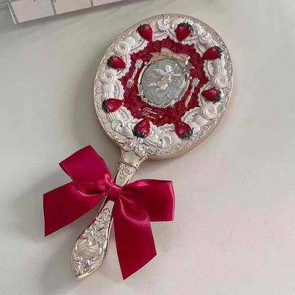 FK hand mirror