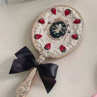 FK hand mirror