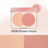 Judydoll blush duos D08 druken peach, featuring an apricot light brown and coral red color combination for a radiant look